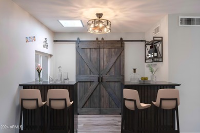 Discover this beautifully remodeled Sun City home in a thriving on Sun City Lakes West and East in Arizona - for sale on GolfHomes.com, golf home, golf lot