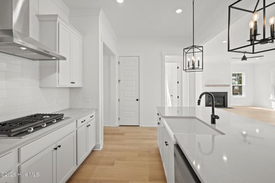 Introducing the Harper plan by Hunter Quinn Homes in the on Brunswick Plantation and Golf Resorts in North Carolina - for sale on GolfHomes.com, golf home, golf lot