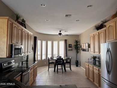 This custom home by Roark Construction is a 3 Bedroom, 2 Bath on Coyote Lakes Golf Club in Arizona - for sale on GolfHomes.com, golf home, golf lot