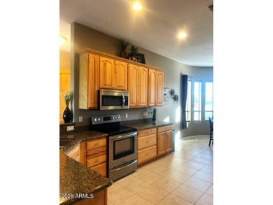 This custom home by Roark Construction is a 3 Bedroom, 2 Bath on Coyote Lakes Golf Club in Arizona - for sale on GolfHomes.com, golf home, golf lot