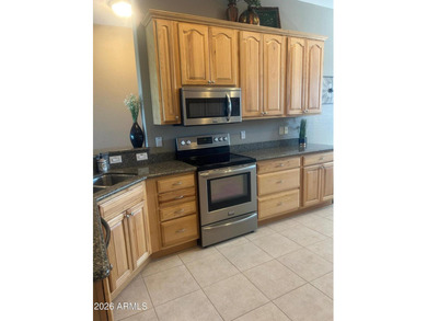 This custom home by Roark Construction is a 3 Bedroom, 2 Bath on Coyote Lakes Golf Club in Arizona - for sale on GolfHomes.com, golf home, golf lot