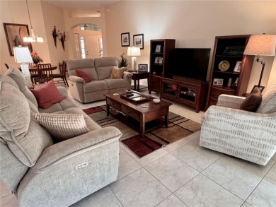 This beautifully maintained and move-in ready Iris Designer home on The Links of Spruce Creek in Florida - for sale on GolfHomes.com, golf home, golf lot