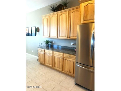 This custom home by Roark Construction is a 3 Bedroom, 2 Bath on Coyote Lakes Golf Club in Arizona - for sale on GolfHomes.com, golf home, golf lot