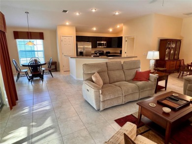 This beautifully maintained and move-in ready Iris Designer home on The Links of Spruce Creek in Florida - for sale on GolfHomes.com, golf home, golf lot
