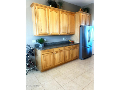 This custom home by Roark Construction is a 3 Bedroom, 2 Bath on Coyote Lakes Golf Club in Arizona - for sale on GolfHomes.com, golf home, golf lot