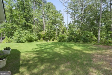 This lovely custom-built home offers a flowing, spacious on Fairfield Plantation Golf and Country Club in Georgia - for sale on GolfHomes.com, golf home, golf lot