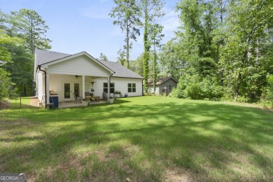 This lovely custom-built home offers a flowing, spacious on Fairfield Plantation Golf and Country Club in Georgia - for sale on GolfHomes.com, golf home, golf lot