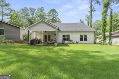 This lovely custom-built home offers a flowing, spacious on Fairfield Plantation Golf and Country Club in Georgia - for sale on GolfHomes.com, golf home, golf lot