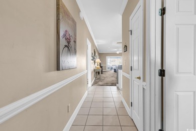 Welcome to this spacious and inviting three-bedroom, two-bath on Tupelo Bay Golf Complex  in South Carolina - for sale on GolfHomes.com, golf home, golf lot