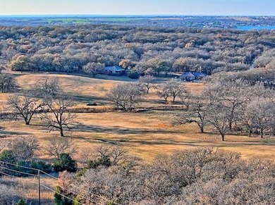 Experience the peaceful lifestyle of Nocona Hills with this on Nocona Hills Golf Course in Texas - for sale on GolfHomes.com, golf home, golf lot