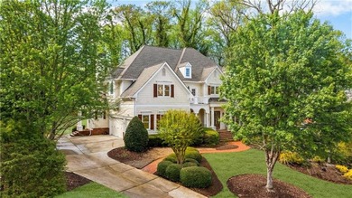 An extraordinary expression of refined luxury and warmth, this on TPC At Sugarloaf Golf Club in Georgia - for sale on GolfHomes.com, golf home, golf lot
