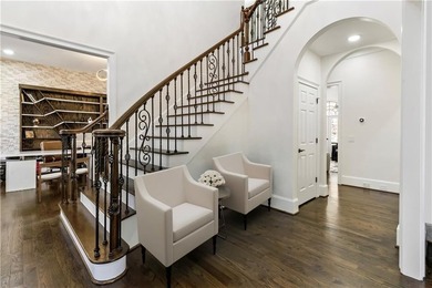 An extraordinary expression of refined luxury and warmth, this on TPC At Sugarloaf Golf Club in Georgia - for sale on GolfHomes.com, golf home, golf lot