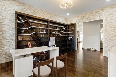 An extraordinary expression of refined luxury and warmth, this on TPC At Sugarloaf Golf Club in Georgia - for sale on GolfHomes.com, golf home, golf lot