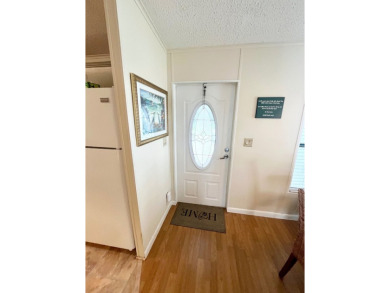 Welcome to your new home in Lake Fairways Country Club! This on Pine Lakes Country Club in Florida - for sale on GolfHomes.com, golf home, golf lot