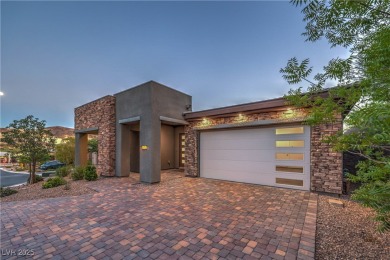 Experience refined resort-style living in this elegant on Reflection Bay Golf Club in Nevada - for sale on GolfHomes.com, golf home, golf lot