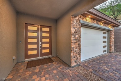 Experience refined resort-style living in this elegant on Reflection Bay Golf Club in Nevada - for sale on GolfHomes.com, golf home, golf lot