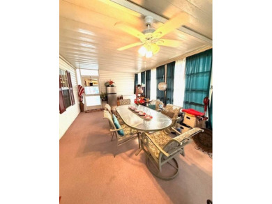 Indulge in the unparalleled luxury of this rare gem nestled on Hamptons Golf Club in Florida - for sale on GolfHomes.com, golf home, golf lot