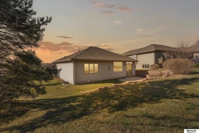This modern single-story home, with the added bonus of a on Players Club At Deer Creek in Nebraska - for sale on GolfHomes.com, golf home, golf lot