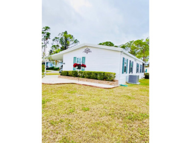 Welcome to your new home in Lake Fairways Country Club! This on Pine Lakes Country Club in Florida - for sale on GolfHomes.com, golf home, golf lot