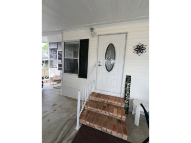 Welcome to your new home in Lake Fairways Country Club! This on Pine Lakes Country Club in Florida - for sale on GolfHomes.com, golf home, golf lot