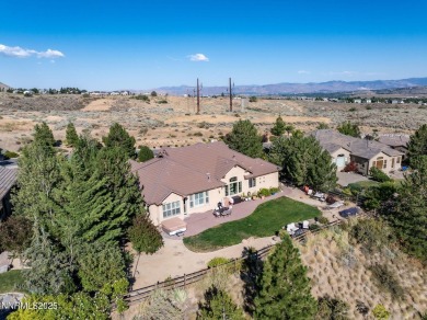 The views of the valley and mountains from the backyard of this on Somersett Country Club - Canyon Nine in Nevada - for sale on GolfHomes.com, golf home, golf lot