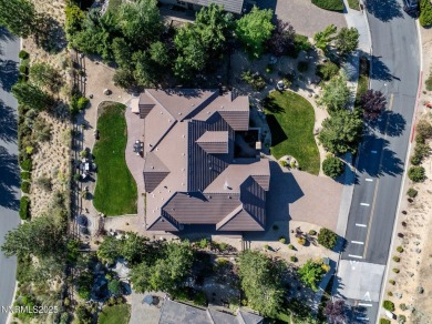 The views of the valley and mountains from the backyard of this on Somersett Country Club - Canyon Nine in Nevada - for sale on GolfHomes.com, golf home, golf lot