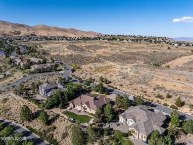 The views of the valley and mountains from the backyard of this on Somersett Country Club - Canyon Nine in Nevada - for sale on GolfHomes.com, golf home, golf lot