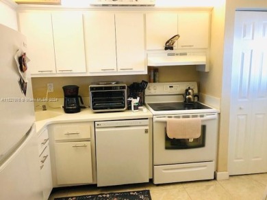 Beautiful corner 2bed/2bath condo unit w/new kitchen appliances on Coral Ridge Country Club in Florida - for sale on GolfHomes.com, golf home, golf lot