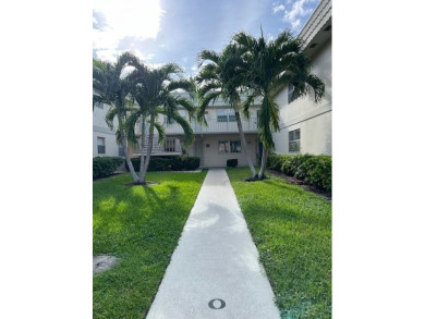 FIRST FLOOR 2/2 TRUE GARDEN VIEW.   NOT ON PARKING LOT  VERY on Kings Point Golf -Flanders Way in Florida - for sale on GolfHomes.com, golf home, golf lot