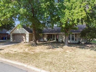 This beautifully maintained 4-bedroom, 3-bathroom home is on Indian Springs Country Club in Oklahoma - for sale on GolfHomes.com, golf home, golf lot