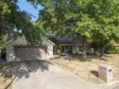 This beautifully maintained 4-bedroom, 3-bathroom home is on Indian Springs Country Club in Oklahoma - for sale on GolfHomes.com, golf home, golf lot