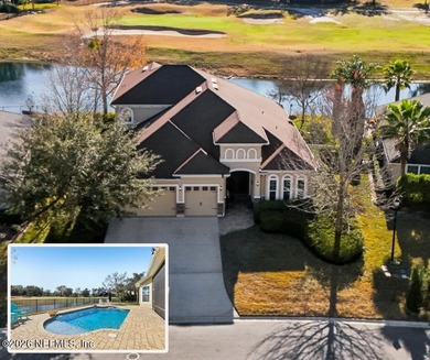 Stunning pool home with a pond to golf course view in gated on Magnolia Point Golf and Country Club in Florida - for sale on GolfHomes.com, golf home, golf lot