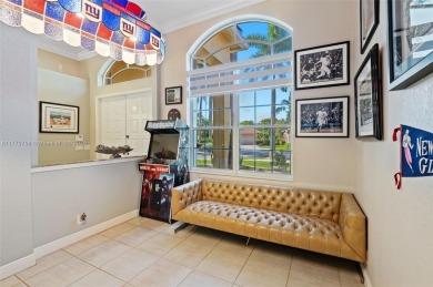 *WOW* AMAZING BRIGHT & SPACIOUS REMODELED 5 BEDROOM/3 FULL BATHS on Weston Hills Country Club in Florida - for sale on GolfHomes.com, golf home, golf lot