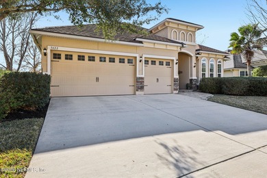 Stunning pool home with a pond to golf course view in gated on Magnolia Point Golf and Country Club in Florida - for sale on GolfHomes.com, golf home, golf lot
