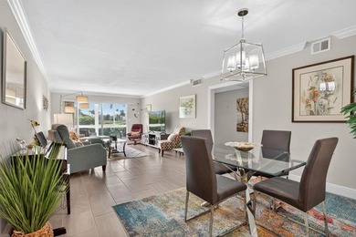EXQUISITE 1ST FL DELUXE MODEL IN SOUGHT AFTER ARUBA VILLAGE ON on Wynmoor Golf Course in Florida - for sale on GolfHomes.com, golf home, golf lot
