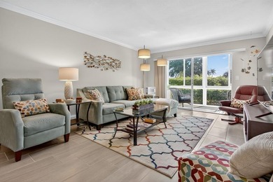 EXQUISITE 1ST FL DELUXE MODEL IN SOUGHT AFTER ARUBA VILLAGE ON on Wynmoor Golf Course in Florida - for sale on GolfHomes.com, golf home, golf lot