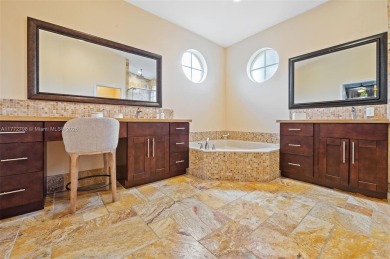 *WOW* AMAZING BRIGHT & SPACIOUS REMODELED 5 BEDROOM/3 FULL BATHS on Weston Hills Country Club in Florida - for sale on GolfHomes.com, golf home, golf lot