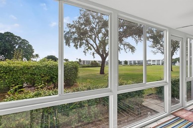 EXQUISITE 1ST FL DELUXE MODEL IN SOUGHT AFTER ARUBA VILLAGE ON on Wynmoor Golf Course in Florida - for sale on GolfHomes.com, golf home, golf lot