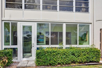 EXQUISITE 1ST FL DELUXE MODEL IN SOUGHT AFTER ARUBA VILLAGE ON on Wynmoor Golf Course in Florida - for sale on GolfHomes.com, golf home, golf lot