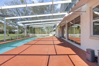 Beautifully crafted custom concrete block home in Crystal River on Plantation Inn and Golf Resort  in Florida - for sale on GolfHomes.com, golf home, golf lot