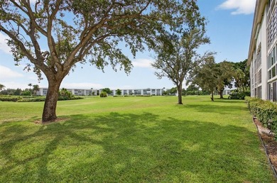 EXQUISITE 1ST FL DELUXE MODEL IN SOUGHT AFTER ARUBA VILLAGE ON on Wynmoor Golf Course in Florida - for sale on GolfHomes.com, golf home, golf lot