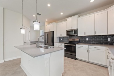 Welcome to 1423 Bunker Drive in Davenport, Florida. Situated on on The Oasis Club at Champions Gate in Florida - for sale on GolfHomes.com, golf home, golf lot