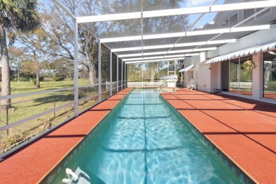 Beautifully crafted custom concrete block home in Crystal River on Plantation Inn and Golf Resort  in Florida - for sale on GolfHomes.com, golf home, golf lot