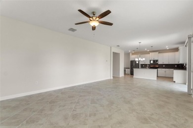 Welcome to 1423 Bunker Drive in Davenport, Florida. Situated on on The Oasis Club at Champions Gate in Florida - for sale on GolfHomes.com, golf home, golf lot