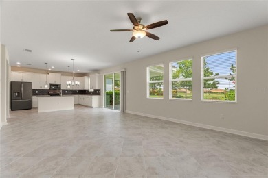 Welcome to 1423 Bunker Drive in Davenport, Florida. Situated on on The Oasis Club at Champions Gate in Florida - for sale on GolfHomes.com, golf home, golf lot