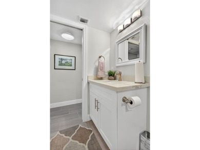 EXQUISITE 1ST FL DELUXE MODEL IN SOUGHT AFTER ARUBA VILLAGE ON on Wynmoor Golf Course in Florida - for sale on GolfHomes.com, golf home, golf lot