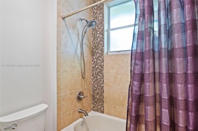 *WOW* AMAZING BRIGHT & SPACIOUS REMODELED 5 BEDROOM/3 FULL BATHS on Weston Hills Country Club in Florida - for sale on GolfHomes.com, golf home, golf lot