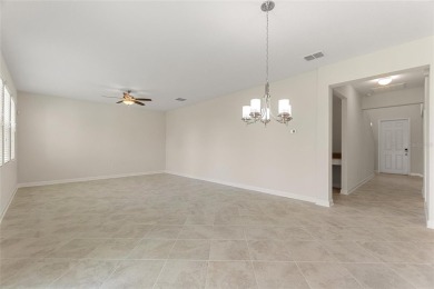Welcome to 1423 Bunker Drive in Davenport, Florida. Situated on on The Oasis Club at Champions Gate in Florida - for sale on GolfHomes.com, golf home, golf lot