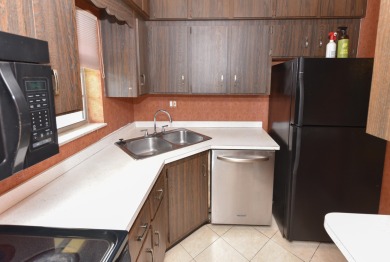 Lowest-Priced Golf Condo - Make It Your Own! Golf daily for FREE on Monterey Yacht and Country Club in Florida - for sale on GolfHomes.com, golf home, golf lot