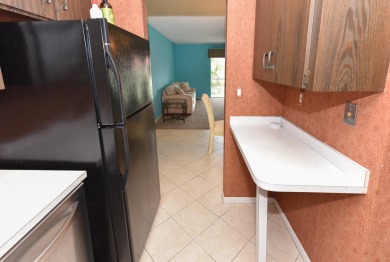 Lowest-Priced Golf Condo - Make It Your Own! Golf daily for FREE on Monterey Yacht and Country Club in Florida - for sale on GolfHomes.com, golf home, golf lot